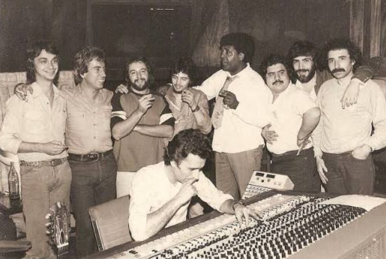 La Banda in the recording studio around 1980, eight musicians behind the mixing desk