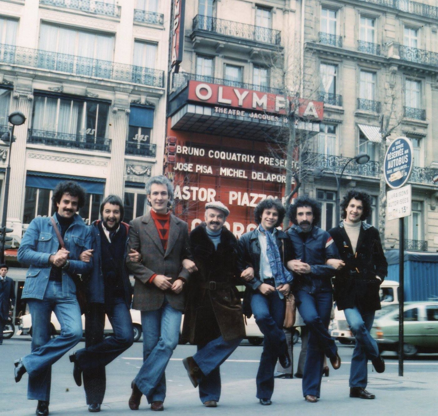 Astor Piazzolla and his Electronic Octet outside the Olympia in Paris, under a marquee announcing Piazzolla, 1977. Luis Ceravolo is second from left.